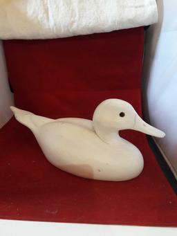 Primed wood duck decoy