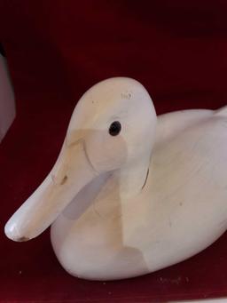 Primed wood duck decoy