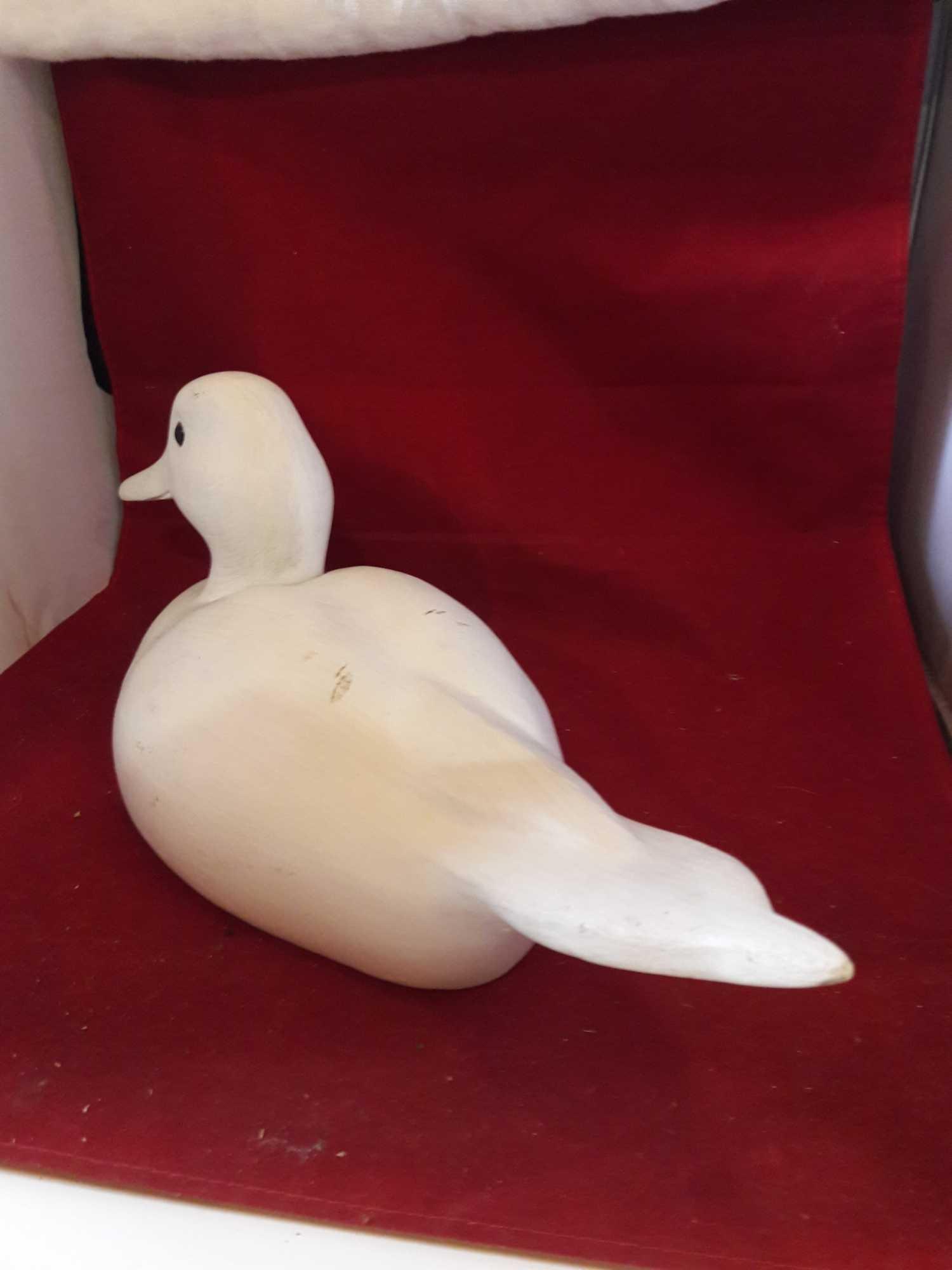 Primed wood duck decoy