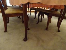 Oval dining room table w/ 8 chairs, 44"W x 100" L x 29"H-(table top needs to be refinished).