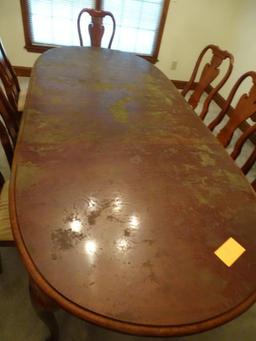 Oval dining room table w/ 8 chairs, 44"W x 100" L x 29"H-(table top needs to be refinished).
