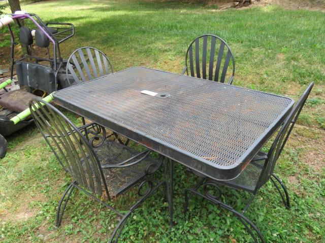 WROUGHT IRON TABLE 38 D  W/ 4 CHAIRS