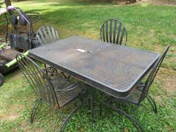 WROUGHT IRON TABLE 38 D  W/ 4 CHAIRS