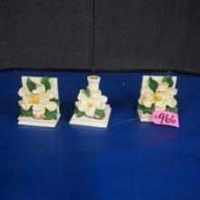 2 BOOKENDS AND CANDLE HOLDER