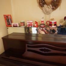 ALL COKE ITEMS ON TOP OF PIANO