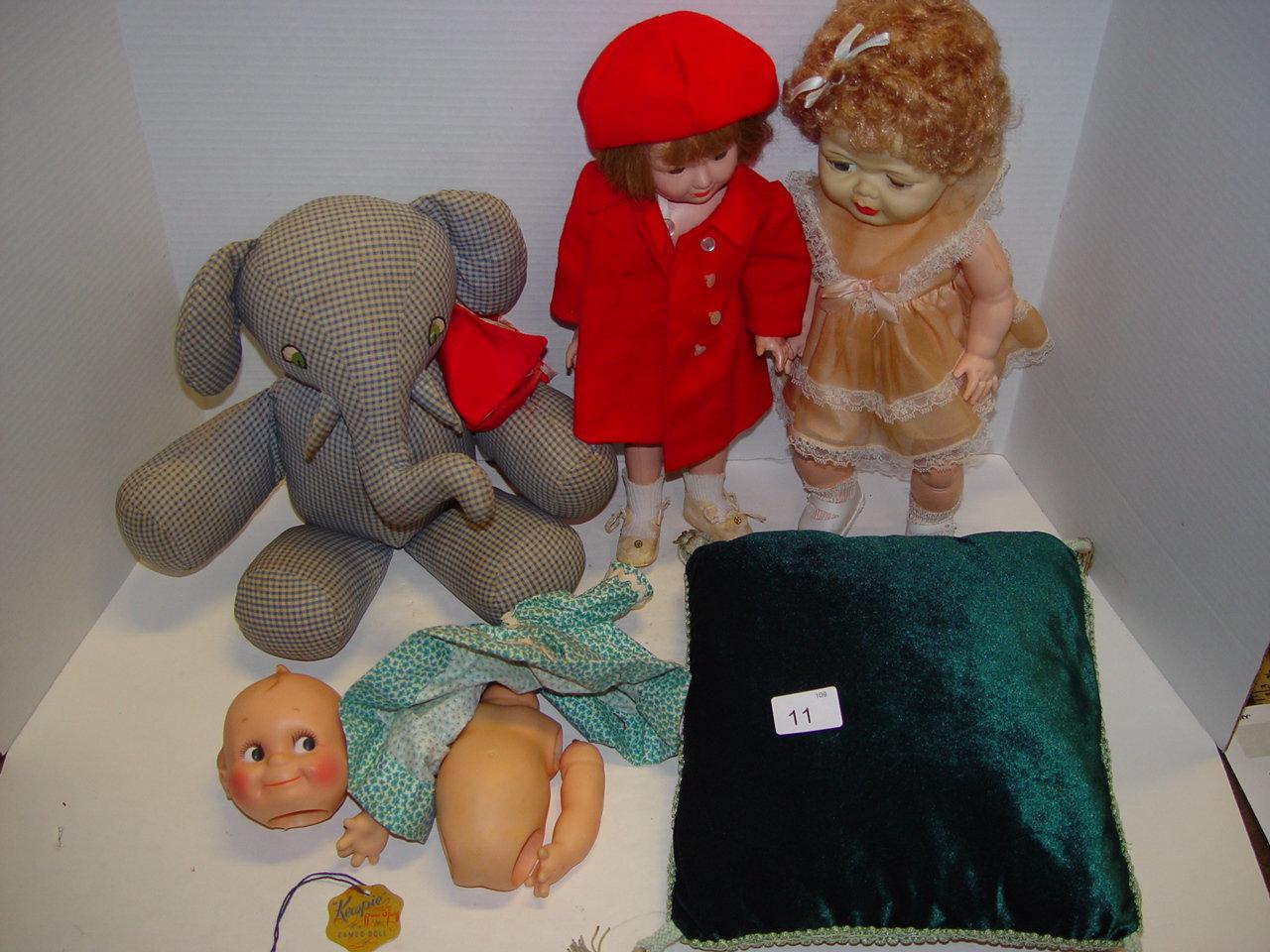 Mixed lot composite sleepy eyed doll, stuffed elephant, Kewpie doll parts and other tallest 15”