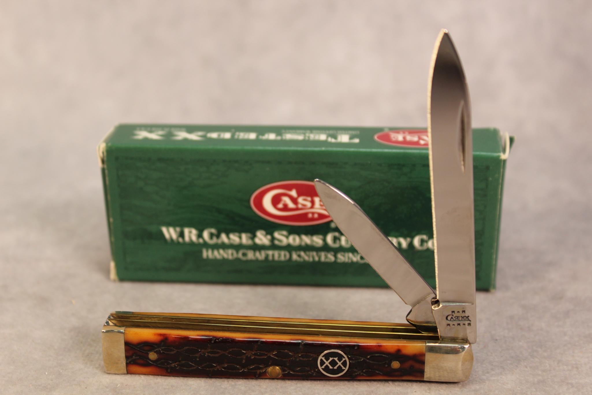 2002 DRK AMBER BONE DR. KNIFE. 6285 SS