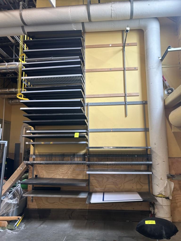 Group Of 4ft Wall Shelves In Back Room