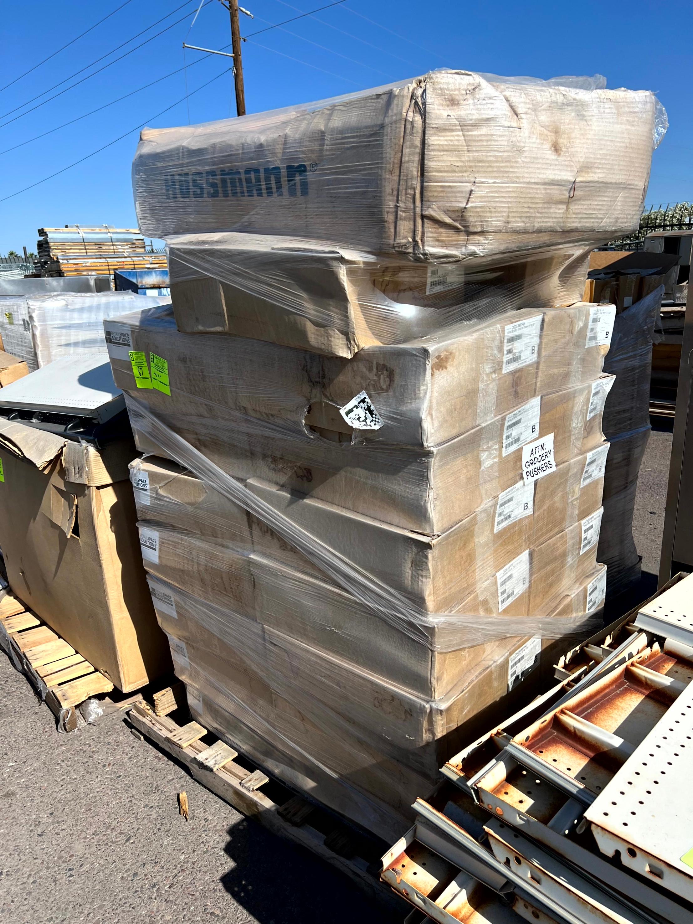 Pallet of Space Solutions Merchandisers and Case S