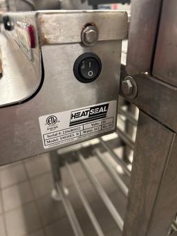 HEAT SEAL WRAPPING STATION W/ BIZERBA PRICING SCALE