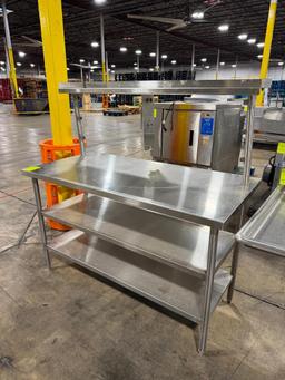Stainless steel table w/ two undershelves and one upper