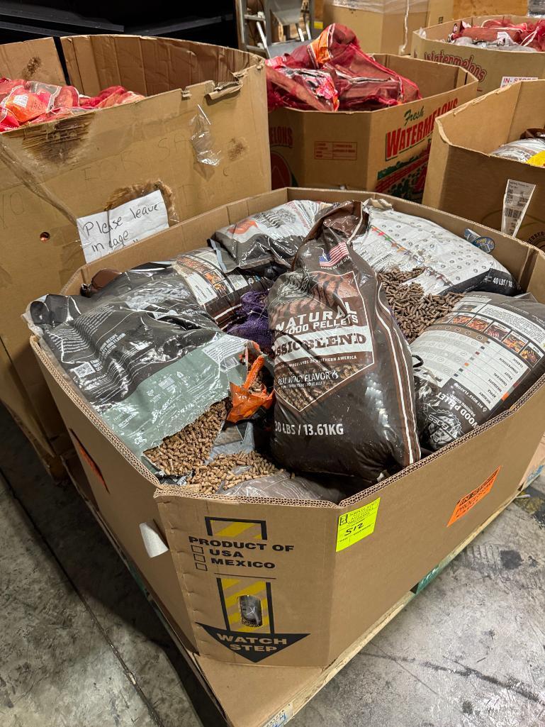 Pallet of smoking pellets and wood