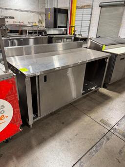 Win-Holt stainless steel table w/ backsplash & bottom cabinet