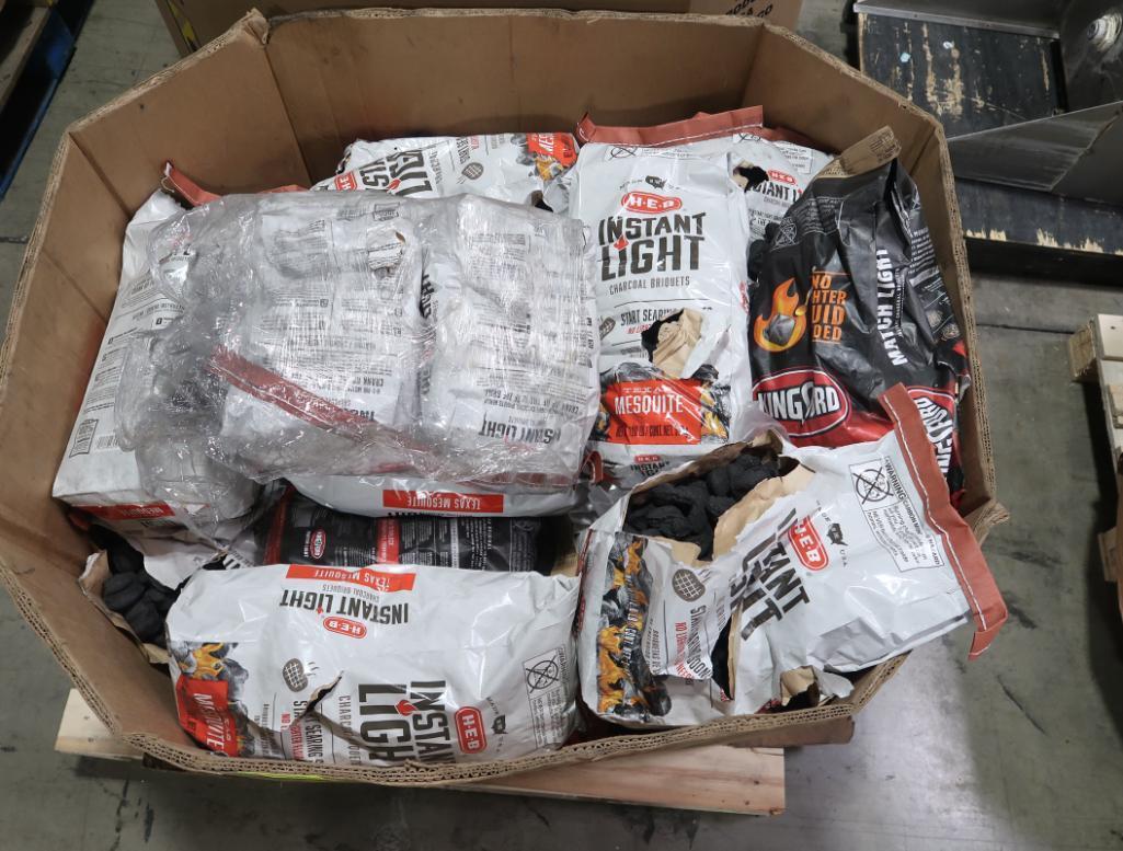 Bin of charcoal and charcoal briquets
