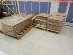 pallets of acoustical ceiling tiles