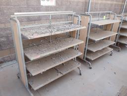 2-sided merchandising shelving units, w/ shelves, on casters