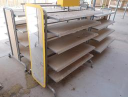 2-sided merchandising shelving units, w/ shelves, on casters