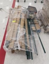 pallet of wire shelving poles, w/ some casters