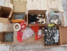 pallet of misc fasteners- screws, crimp-on banding clamps, concrete bolts, etc