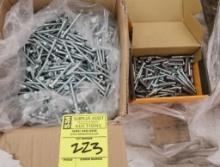 box of 1/4" x 2 1/2" lag bolts, 1/4" x 2 1/4" bolts & sleeves, etc