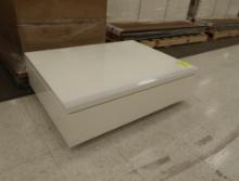 nesting platforms, top lifts w/ help of hydraulic cylinders
