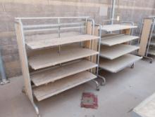 2-sided merchandising shelving units, w/ shelves, on casters