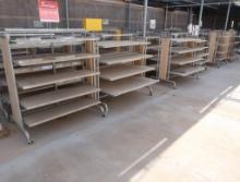 2-sided merchandising shelving units, w/ shelves, on casters