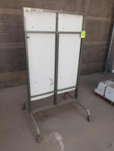 2-sided merchandising shelving unit, no shelves, on casters