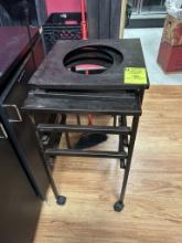 GROUP OF METAL FLORAL BUCKET TABLES ON CASTERS