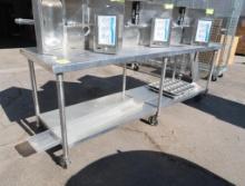 stainless table w/ undershelf & can opener, on casters