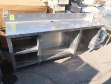 stainless table w/ backsplash, trash hole, & storage under
