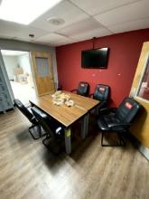 TABLES AND CHAIRS IN BREAK ROOM