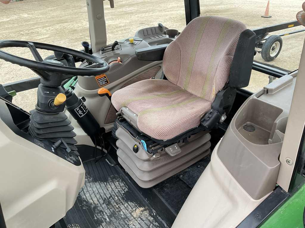 2015 John Deere 6115D Tractor