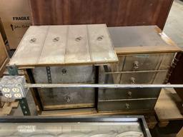 Pallet of damaged cabinet top and bottom