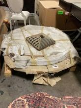 Pallet of two round table tops