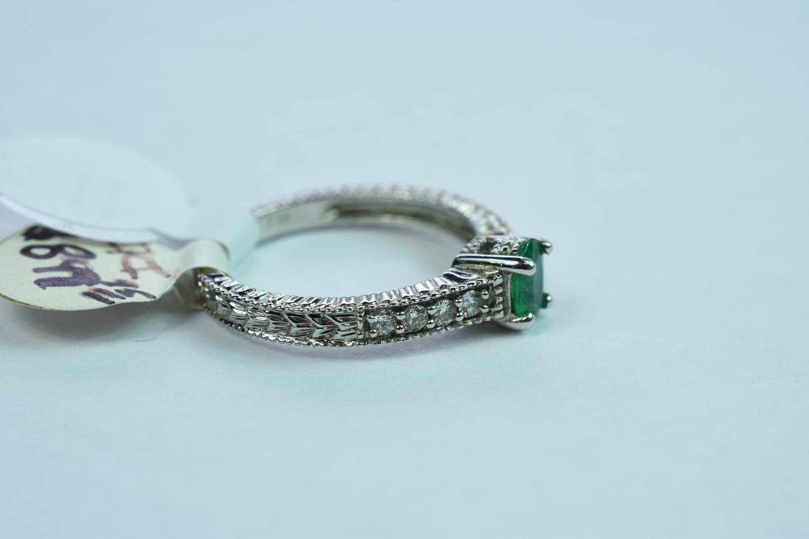 14 KT DIAMOND & EMERALD RING .14 CT DIAMOND TW, 3 GTW, $899.00 RETAIL VALUE ,SIZE 6 1/2