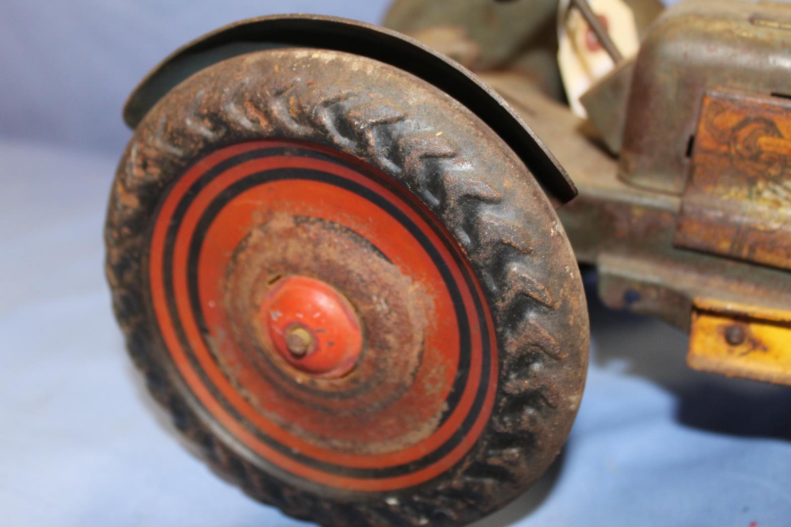 UNKNOWN MAKER STAMPED MEDAL TRACTOR, 16 IN LONG