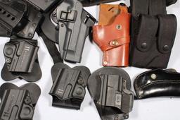 12 HOLSTERS & 4 MAG HOLDERS