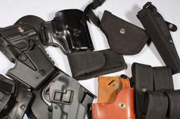 12 HOLSTERS & 4 MAG HOLDERS