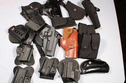 12 HOLSTERS & 4 MAG HOLDERS