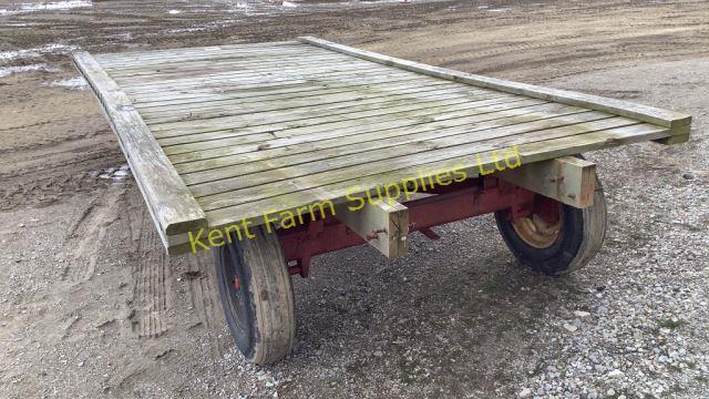 FLAT BED WOODEN WAGON ON 6 TON KASTON RUNNING GEAR