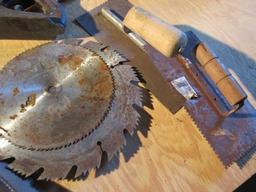Homemade wood tool caddy with mixed tools ;including Stanley plane, leather tool holsters, sawblades