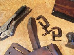 Homemade wood tool caddy with mixed tools ;including Stanley plane, leather tool holsters, sawblades