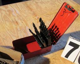 large assortment of allen wrenches and a drill index