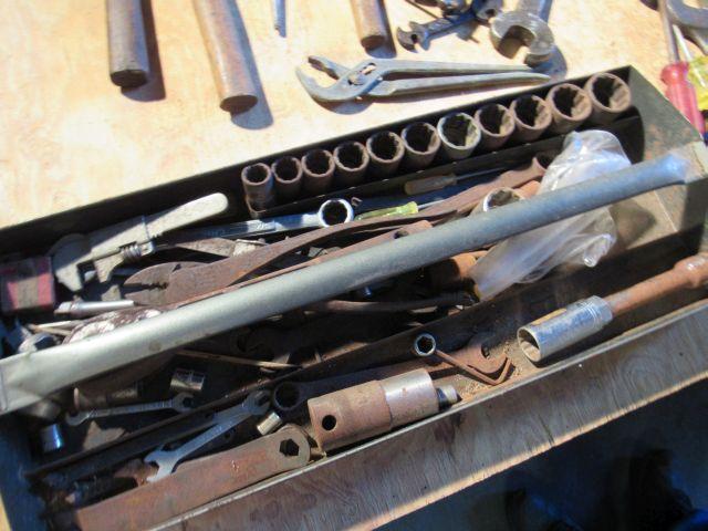 tool box of pullers, hammers, punches