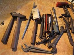 tool box of pullers, hammers, punches