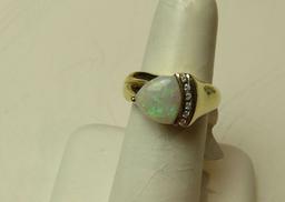 14K yellow gold opal ring size 6 1/4 weight 6.0 g with (6) @dia 1.5 points each