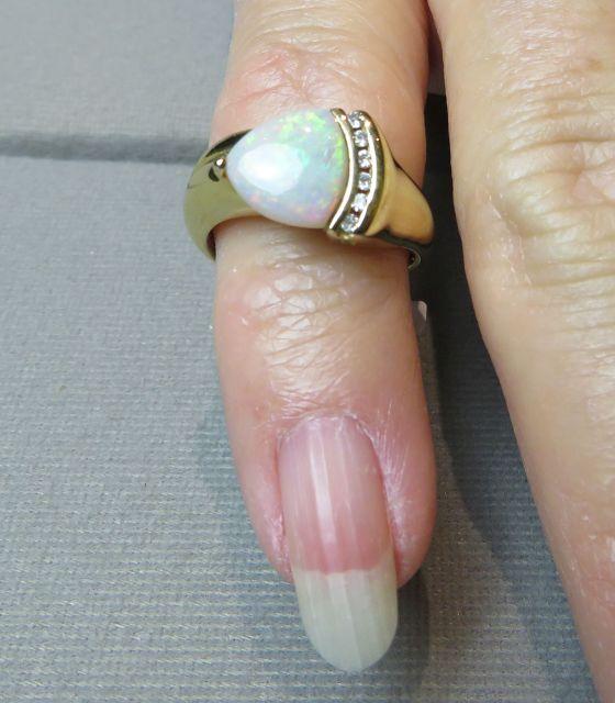 14K yellow gold opal ring size 6 1/4 weight 6.0 g with (6) @dia 1.5 points each