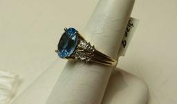 10K -yg- oval Helenite ring, size 7 1/2, weight 4.0, with 12 cubic zirconia