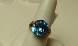 10K -yg- oval Helenite ring, size 7 1/2, weight 4.0, with 12 cubic zirconia